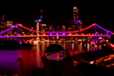 A creative perspective of Story Bridge captured through a glass ball lens.